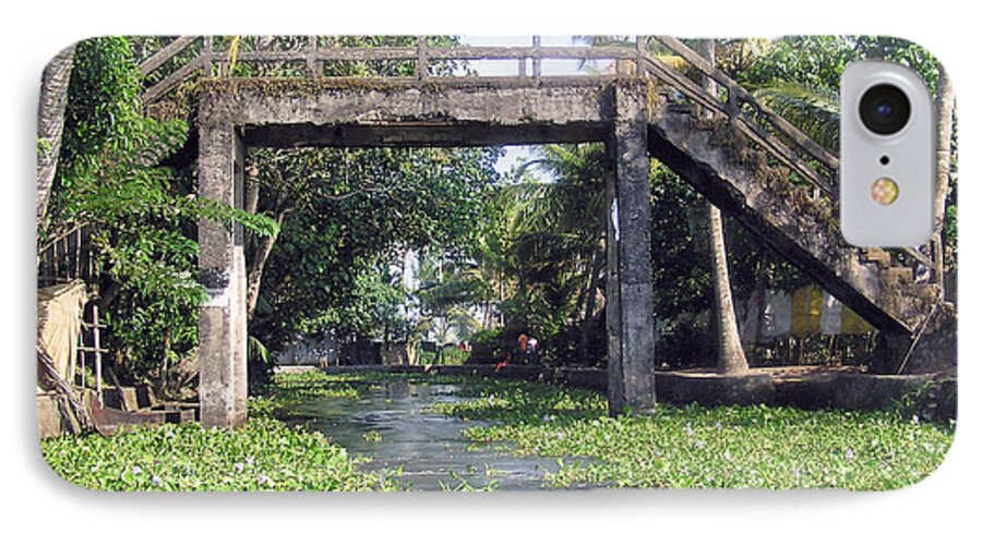Alleppey iPhone 8 Case featuring the photograph An old stone bridge over a canal in Alleppey by Ashish Agarwal