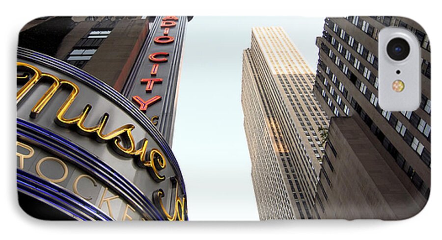 New York City iPhone 8 Case featuring the photograph Radio City Music Hall by Michael Dorn