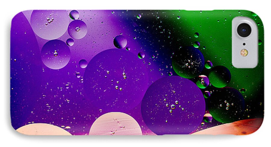 Oil And Water Image Macro Closeup Purple Green Space iPhone 8 Case featuring the photograph The far Side Moons by Bruce Pritchett