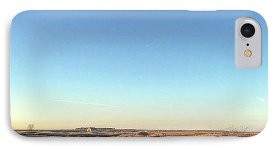 Natureonly iPhone 8 Case featuring the photograph Thornham Marsh Lit By The Setting Sun by John Edwards