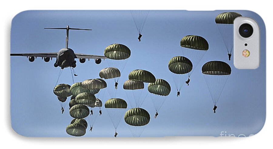 Parachutist iPhone 8 Case featuring the photograph U.s. Army Paratroopers Jumping by Stocktrek Images