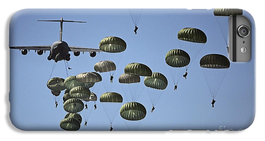 Parachutist iPhone 8 Plus Case featuring the photograph U.s. Army Paratroopers Jumping by Stocktrek Images