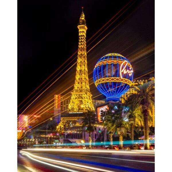 Lasvegas Poster featuring the photograph Paris Las Vegas Strip Light Show - #1 by Susan Candelario