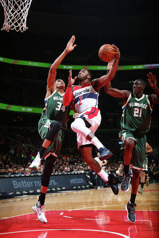 John Wall Poster featuring the photograph John Wall and Giannis Antetokounmpo by Ned Dishman