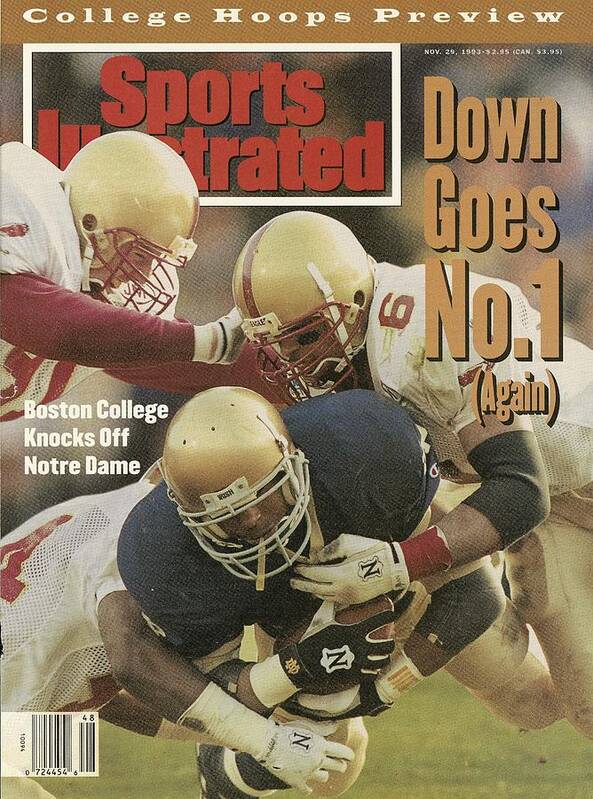 Magazine Cover Poster featuring the photograph Boston College Defense Stops University Of Notre Dame Sports Illustrated Cover by Sports Illustrated