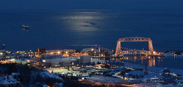 Moon Light-great Lakes-lake Superior-harbor-water-lift Bridge-duluth Mn-cityscape-night-winter-ice-landscape Poster featuring the photograph Moon-Lit Arrival by Gregory Israelson