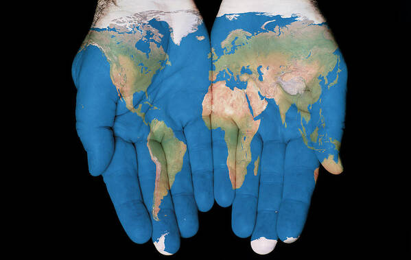 World Map Poster featuring the photograph World In Our Hands by Jim Vallee