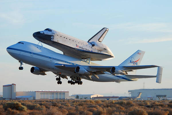 Space Poster featuring the photograph Space Shuttle Atalantis departs Edwards AFB July 1 2007 by Brian Lockett