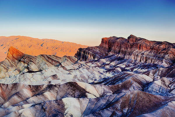 06000000 Poster featuring the photograph Sunrise at Zabriskie Point, Death Valley by Eugene Nikiforov