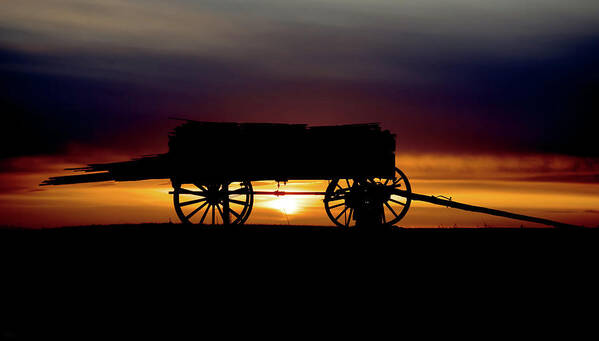 Wagon Poster featuring the photograph Last Load - wagon with load of lumber in silhouette with sunset by Peter Herman