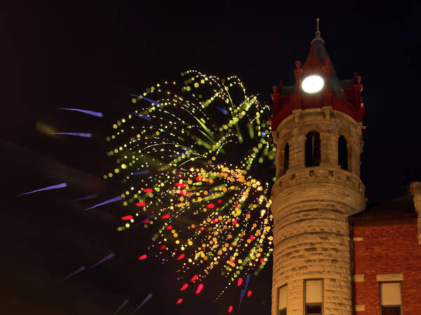 Peter Herman Fireworks Stoughton Wi Clock Tower Iconic Abstract Wisconsin Nightime Dark Fire Opera House City Hall Poster featuring the photograph Fireworks at Stoughton WI Clock Tower Opera House City Hall by Peter Herman