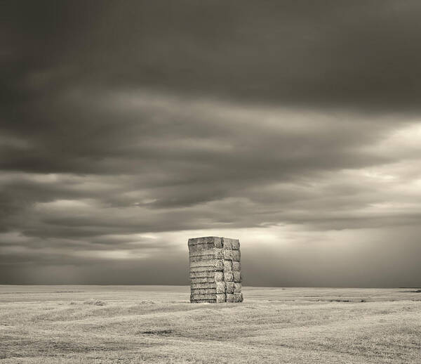 Hay Poster featuring the photograph Isolation - Rectangular haybale monolith on a wheat field of ND prairie ver 2 of 2 by Peter Herman