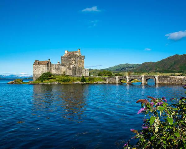 Scotland Poster featuring the photograph Eilean Donan Castle In Scotland by Andreas Berthold