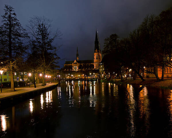 Uppsala By Night Poster featuring the photograph Uppsala by night by Torbjorn Swenelius