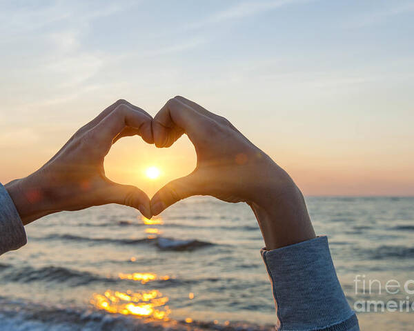 Heart Poster featuring the photograph Fingers heart framing ocean sunset by Elena Elisseeva