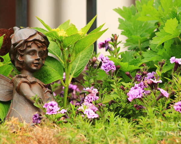Angel Poster featuring the photograph Flower-bed mit an angel statue by Amanda Mohler