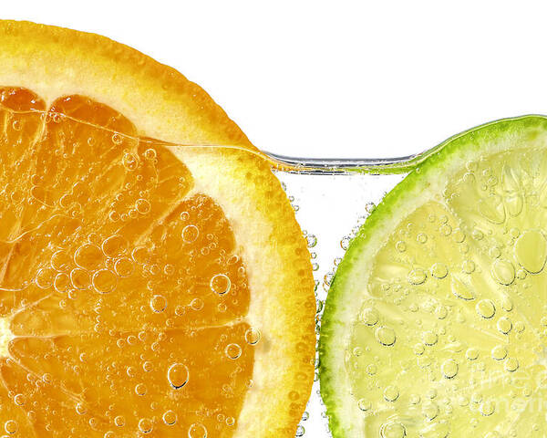 Orange Poster featuring the photograph Orange and lime slices in water by Elena Elisseeva