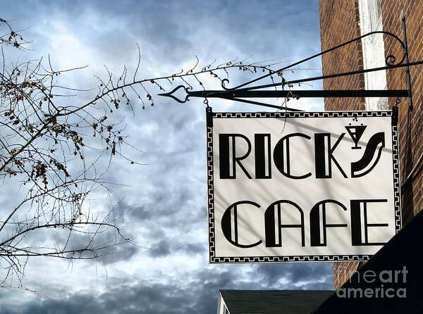 Streetscape Poster featuring the photograph Ricks Cafe by Ellen Cotton