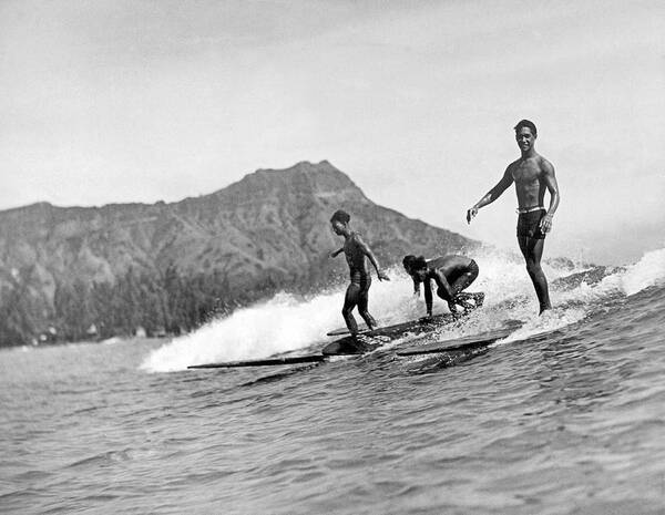 16-20 Years Poster featuring the photograph Surfing In Honolulu by Underwood Archives