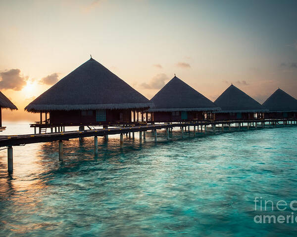 Amazing Poster featuring the photograph Waterbungalows At Sunset by Hannes Cmarits