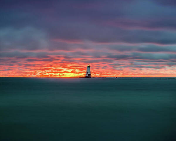 Ludington Mi Poster featuring the photograph Glowing Sunset on Lake With Lighthouse by Lester Plank