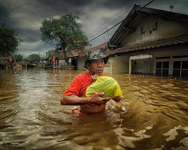 Documentary Poster featuring the photograph In The Middle Of The Flood by Ujang Ubed