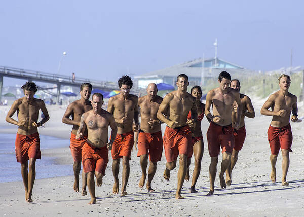  Life Guard Poster featuring the photograph Kure Beach Life guards on the run by WAZgriffin Digital