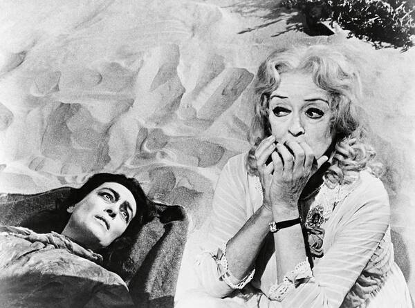Bette Davis Poster featuring the photograph BETTE DAVIS and JOAN CRAWFORD in WHAT EVER HAPPENED TO BABY JANE? -1962-. by Album
