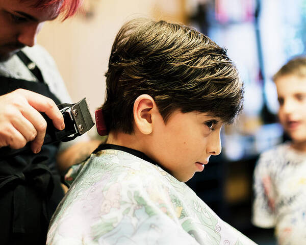 Happy Boy With New Look After Cutting Hair In Salon Poster by Cavan Images  - Fine Art America
