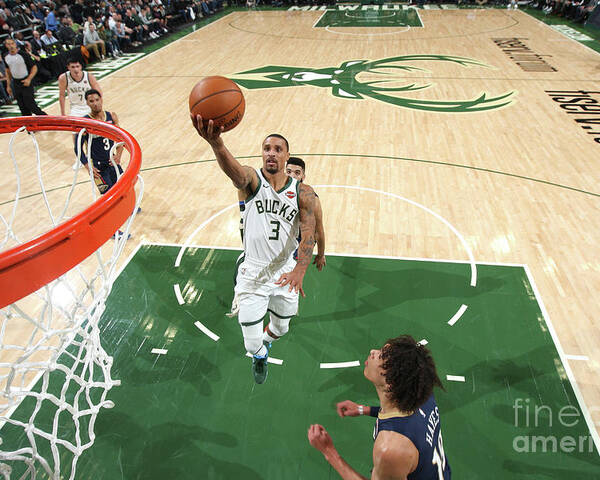 George Hill Poster featuring the photograph New Orleans Pelicans V Milwaukee Bucks by Gary Dineen