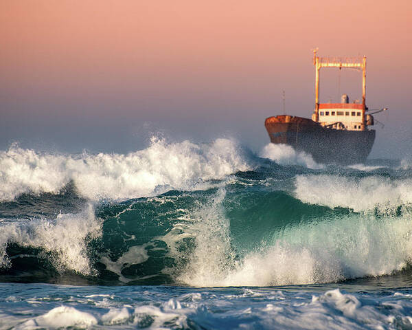 Sea Poster featuring the photograph Abandoned Ship and the stormy waves by Michalakis Ppalis