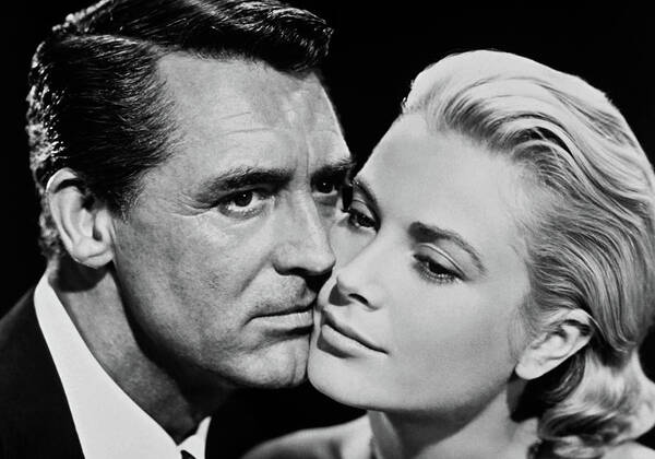 Cary Grant Poster featuring the photograph Cary Grant And Grace Kelly Closeup In To Catch A Theif by Globe Photos