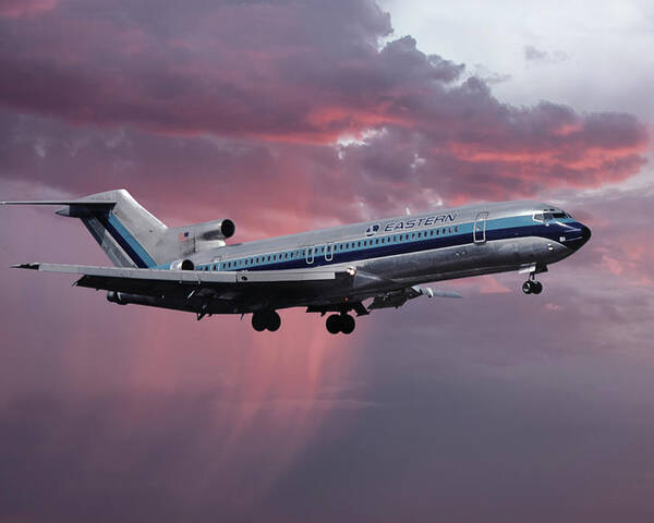 Eastern Airlines Poster featuring the photograph Eastern Boeing 727-225 Landing in a Winter Storm Sunset by Erik Simonsen