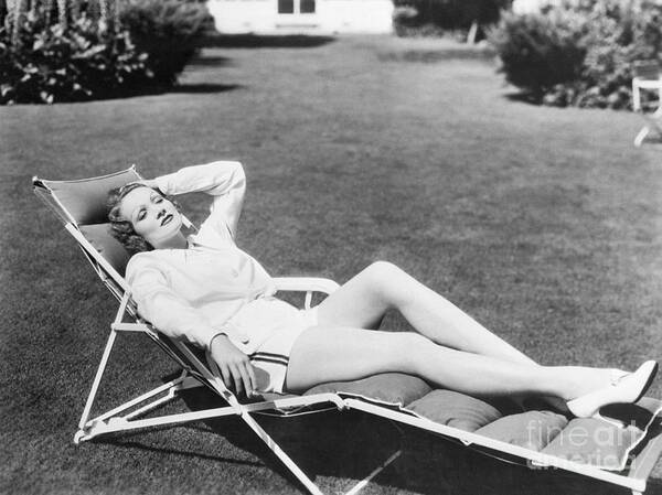 Marlene Dietrich Relaxing In A Lawn Poster by Bettmann - Photos.com