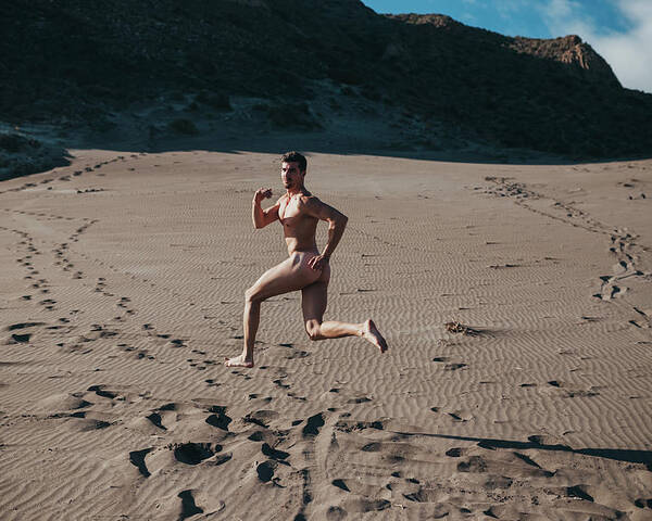 600px x 480px - Naked Man Running Through The Desert Dunes Poster by Cavan Images - Fine  Art America