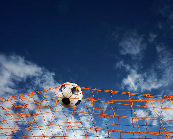 Soccer Ball Going Into Goal Net Poster By Fuse