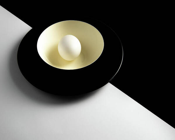 Still-life Poster featuring the photograph Single fresh white egg on a yellow bowl by Michalakis Ppalis