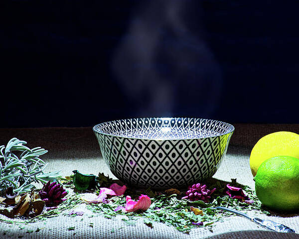 Tea Poster featuring the photograph A drinking bowl with tea and herbs. by Bernhard Schaffer