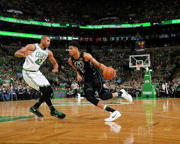 Giannis Antetokounmpo Poster featuring the photograph Al Horford and Giannis Antetokounmpo by Brian Babineau