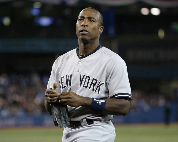 Alfonso Soriano Poster featuring the photograph Alfonso Soriano by Tom Szczerbowski