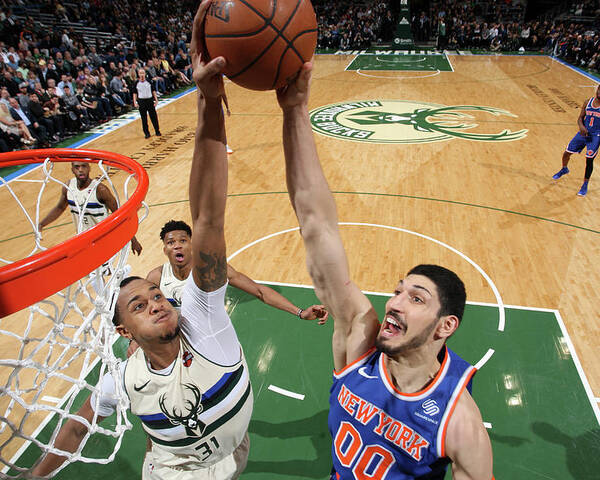 Nba Pro Basketball Poster featuring the photograph Enes Kanter and John Henson by Gary Dineen