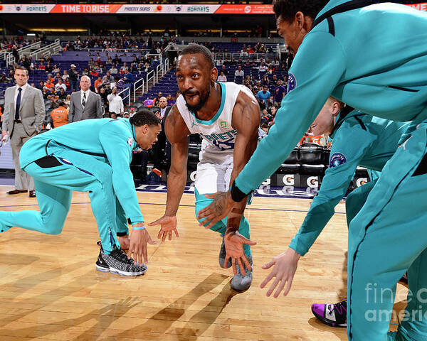 Kemba Walker Poster featuring the photograph Kemba Walker by Barry Gossage