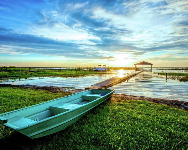 Docks Poster featuring the photograph Rowboat at the Water's Edge by Debra and Dave Vanderlaan