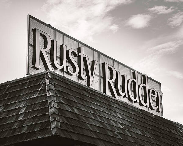 Rusty Poster featuring the photograph Rusty Rudder Sign by Jason Fink