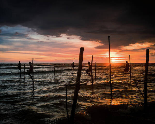Fisherman Poster featuring the photograph Sunset and Stilt Fishermen by Arj Munoz