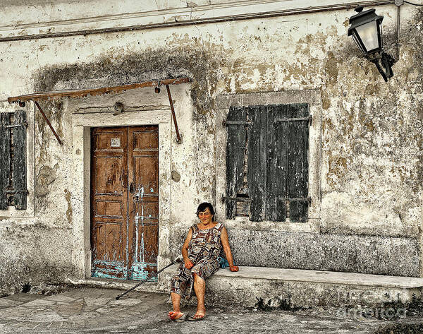 Corfu Greece Candid Old Dirty House Women Sitting Resting Life-style Human Home Portrait Lady Greek Scene Decrepit Rusted Decayed Degenerated Deteriorate Captivating Rotten Retired Decomposed Loved Odd Outlandish Bizarre Peculiar Conceptual Quirky Eccentric Weird Rustic Corroded Tarnished Past Decay Magical Door Window Haven Shattered Texture Nostalgia Abandoned Nostalgic Derelict Disintegrated Touching Destroyed Falling Down Demolished Corrode Ancient Bygone Battered Crippled Dated Journalism Poster featuring the photograph Was Beautiful Once by Tatiana Bogracheva