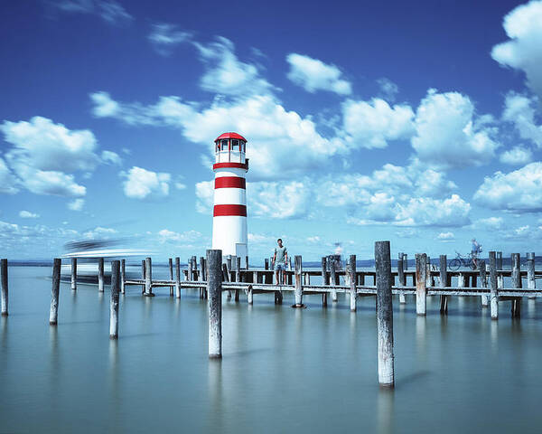 Destinations Poster featuring the photograph White-red lighthouse in Podersdorf am See by Vaclav Sonnek
