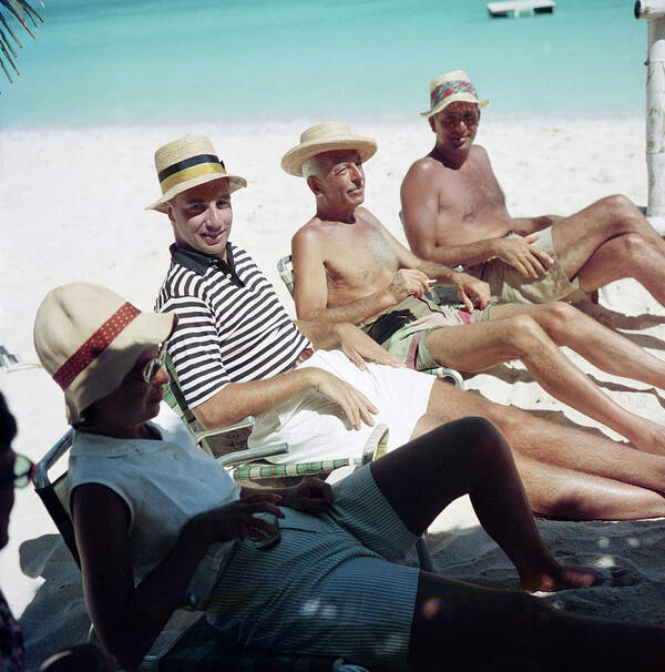 Straw Hat Poster featuring the photograph Holiday In Antigua by Slim Aarons