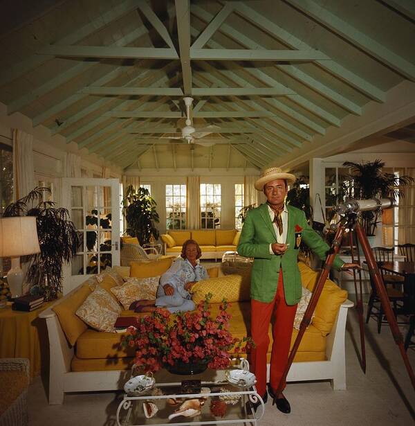 Straw Hat Poster featuring the photograph Island Lookout by Slim Aarons