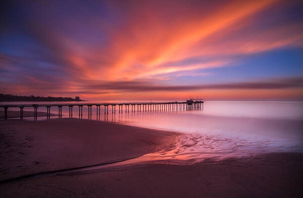 California; Long Exposure; Ocean; Reflection; San Diego; Seascape; Sky; Sunset; Surf; Clouds; Waves Poster featuring the photograph Scripps Pier Sunset by Larry Marshall